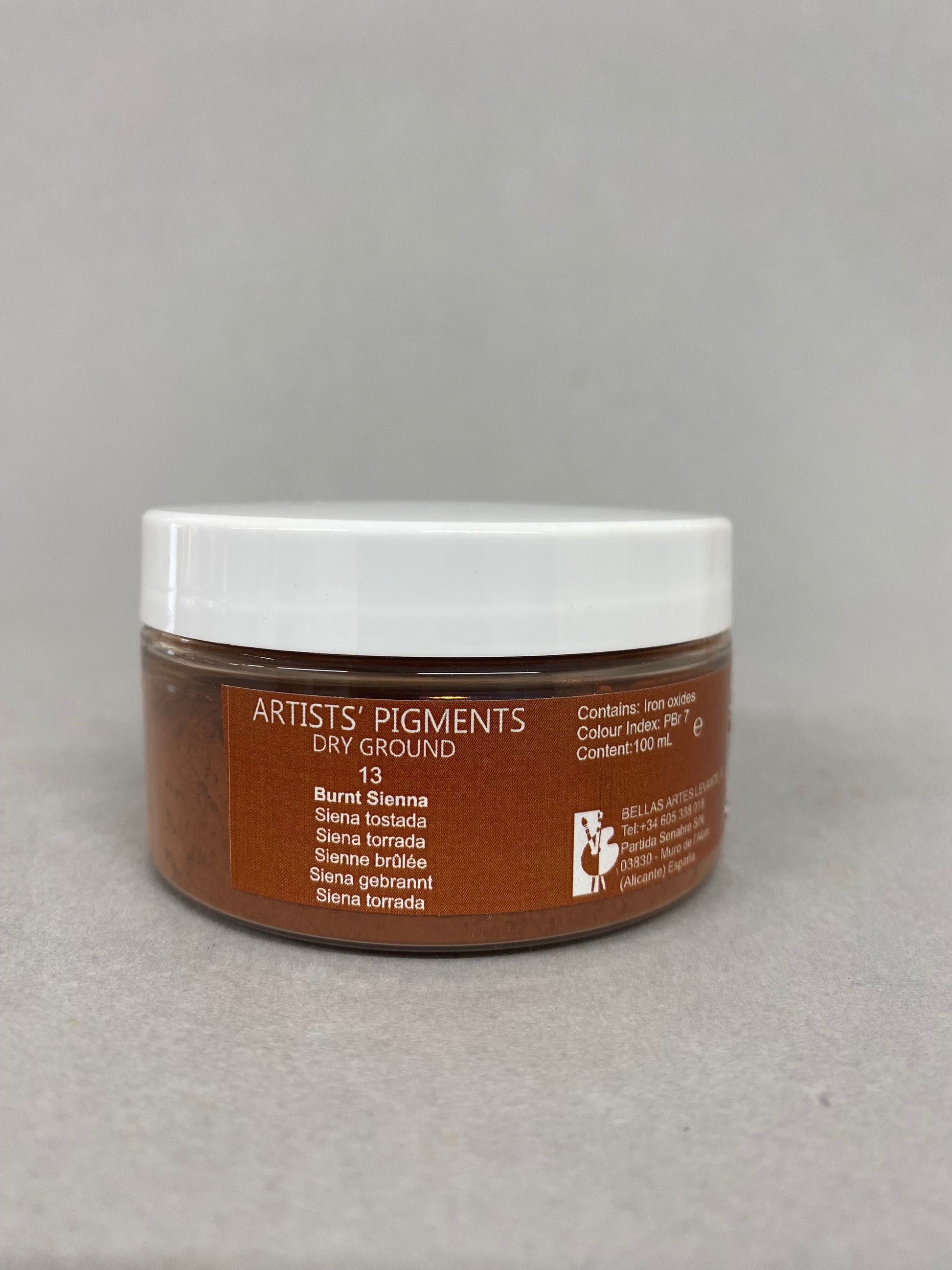 Jar of Artists' Pigments on a gray background