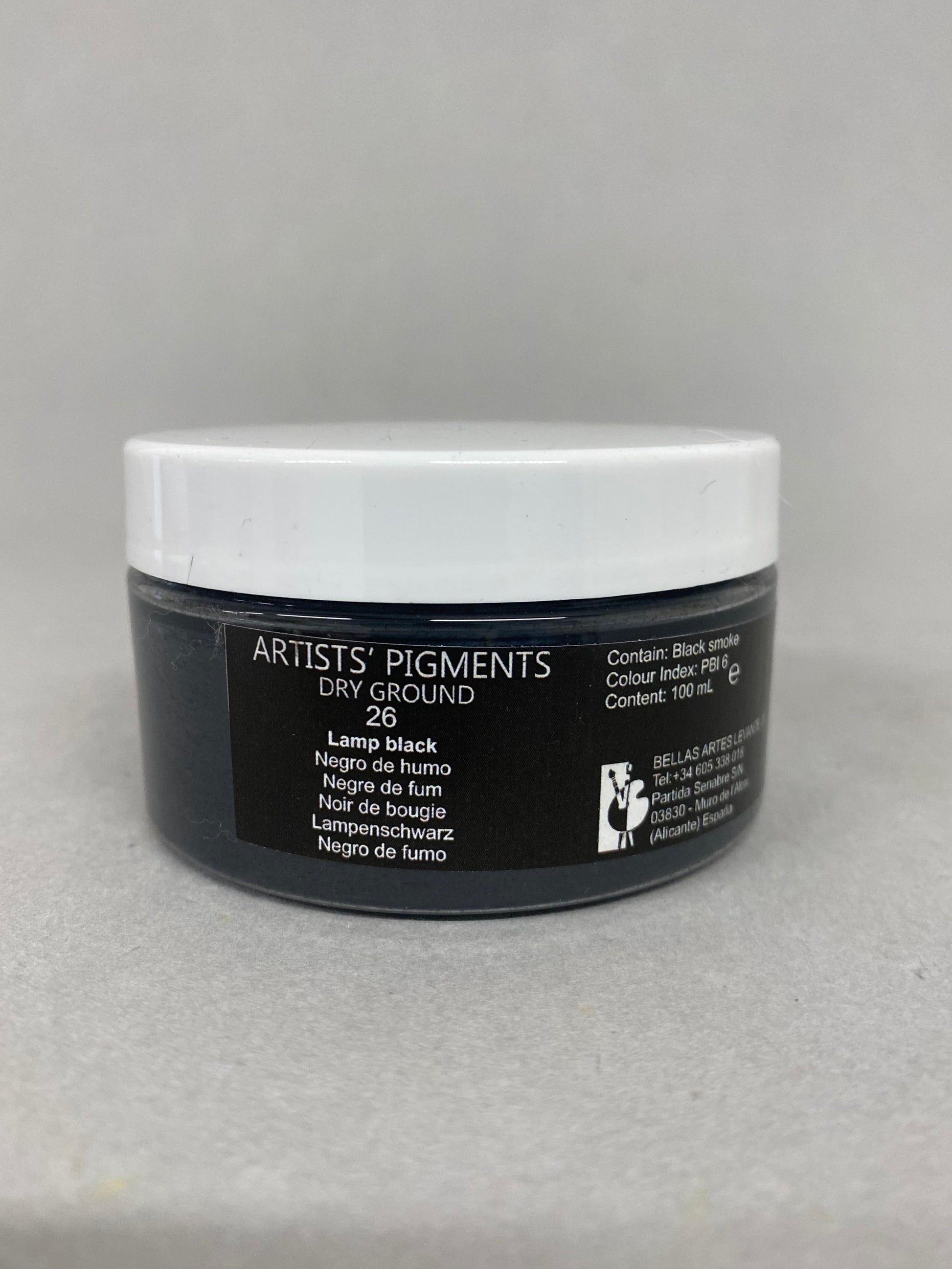 Container of Artists' Pigments  on a gray background