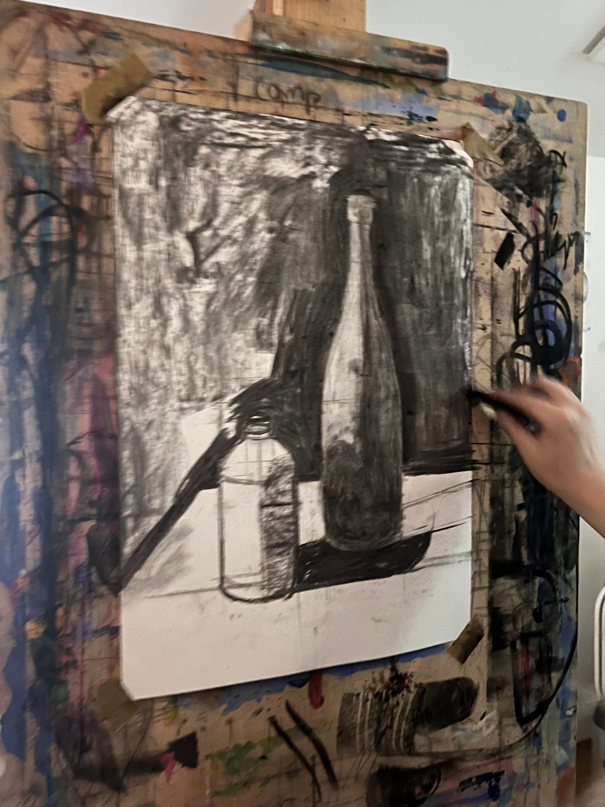 Still Life Drawing of two bottles in an outline stage. 