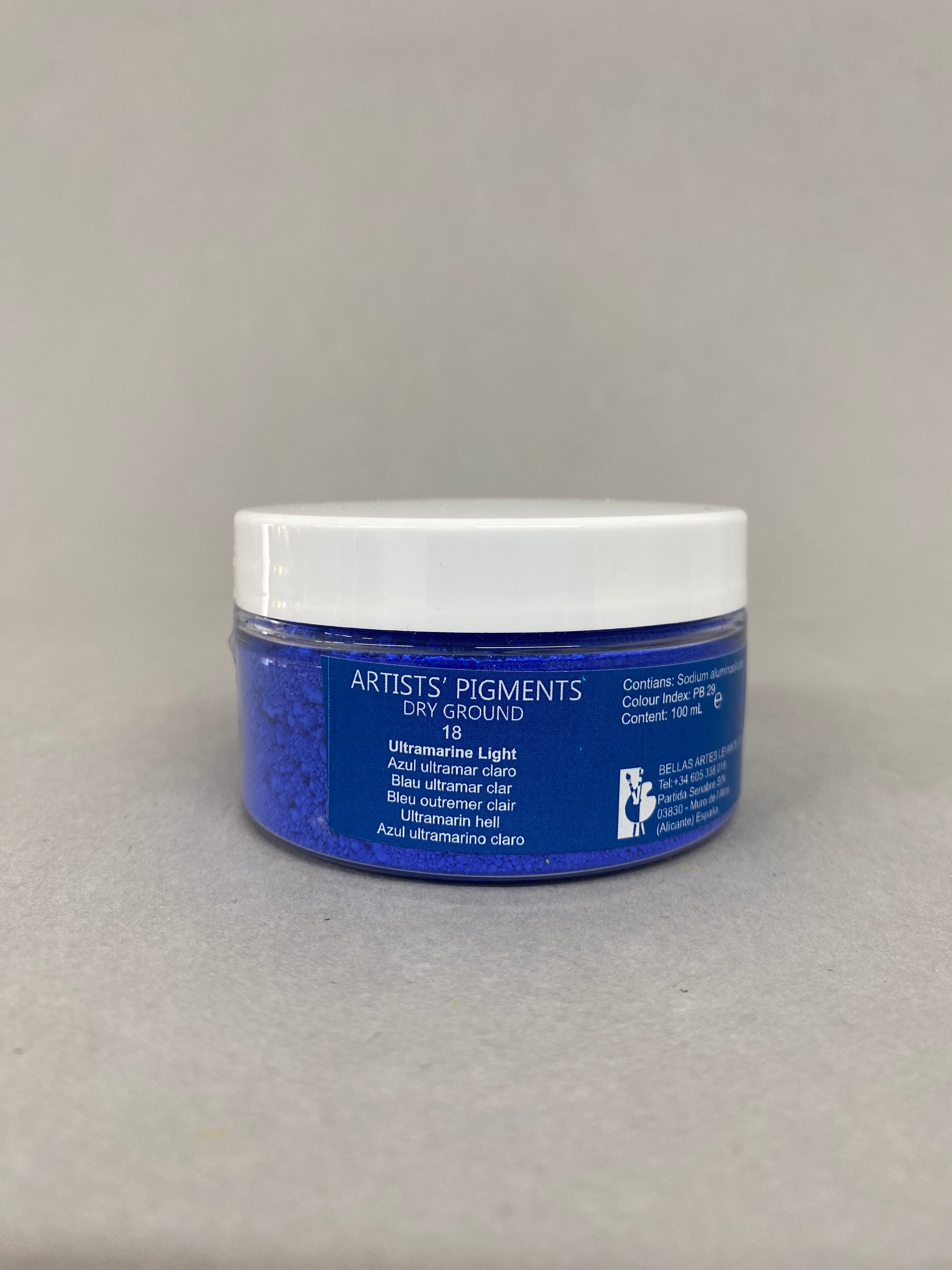 Blue container with white lid on a gray background